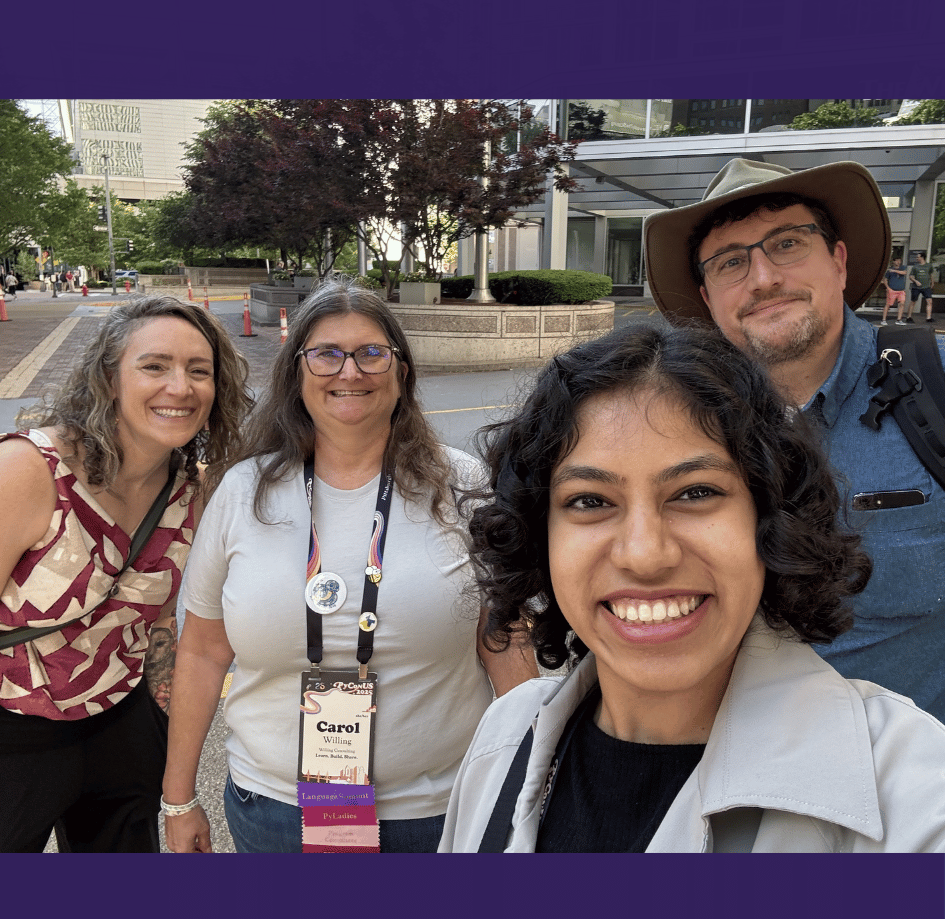 Four pyOpenSci community members, including Carol Willing, smiling together outdoors at PyCon US 2023.